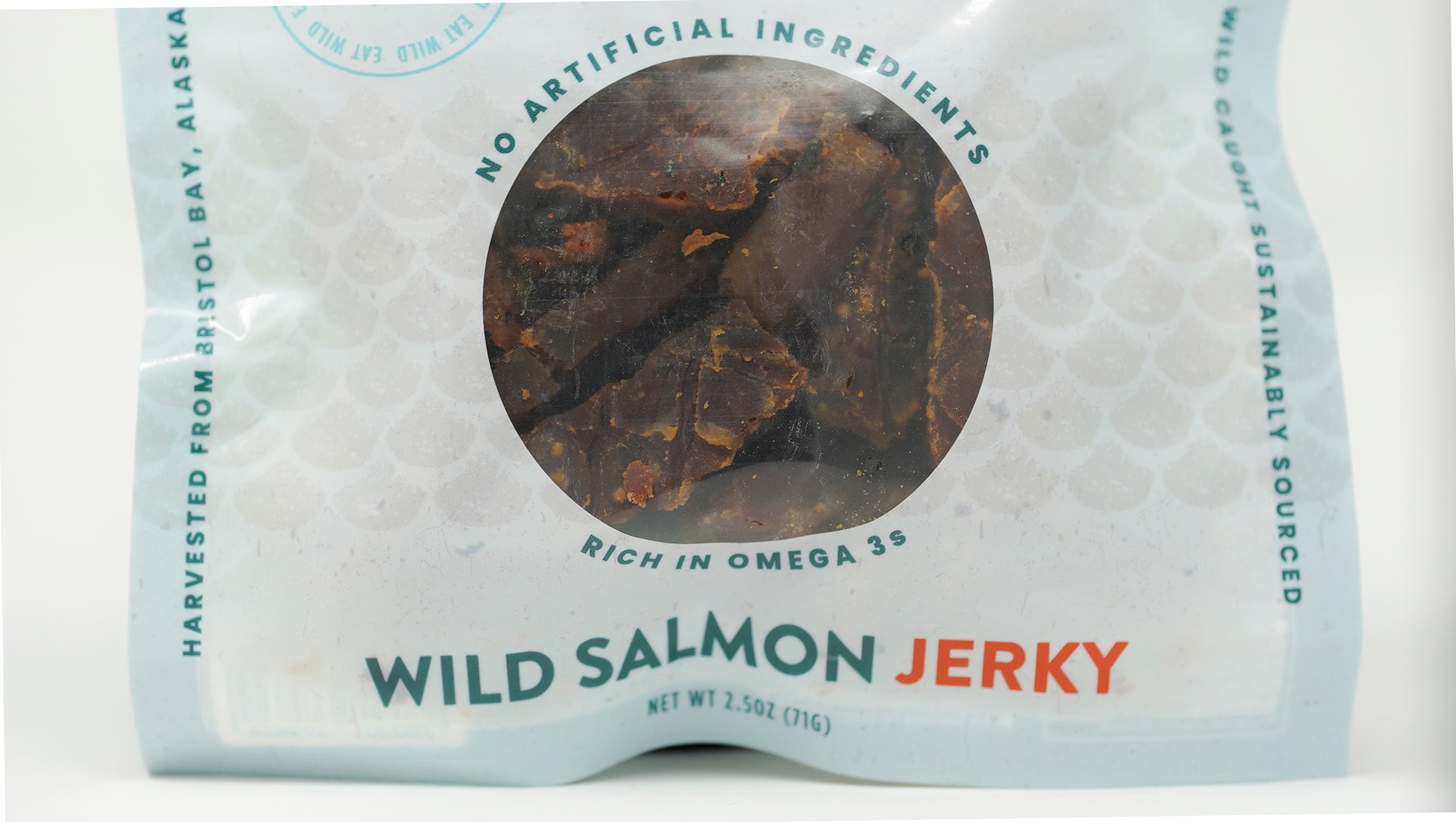 Close up front of bag of Eva's Wild salmon jerky